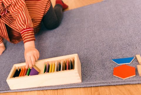 Learning materials in a montessori methodology school being manipulated by children